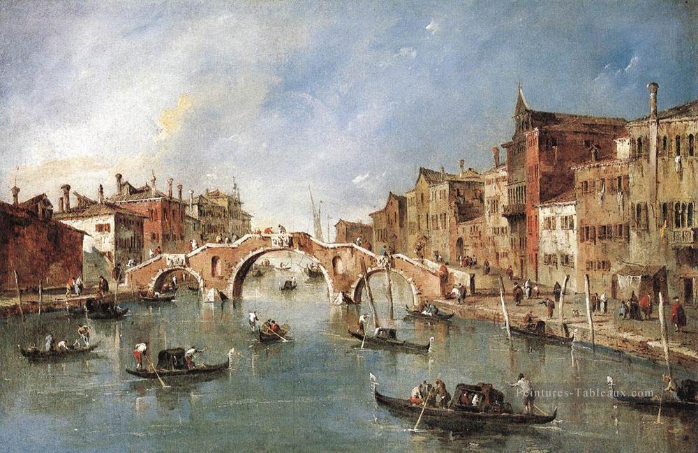 Le Pont aux Trois Arches de Cannaregio école vénitienne Francesco Guardi Peintures à l'huile